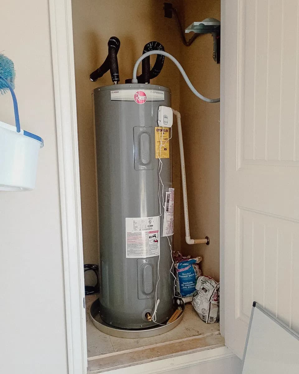 New Rheem electric water heater with a flood stop valve in the same closet