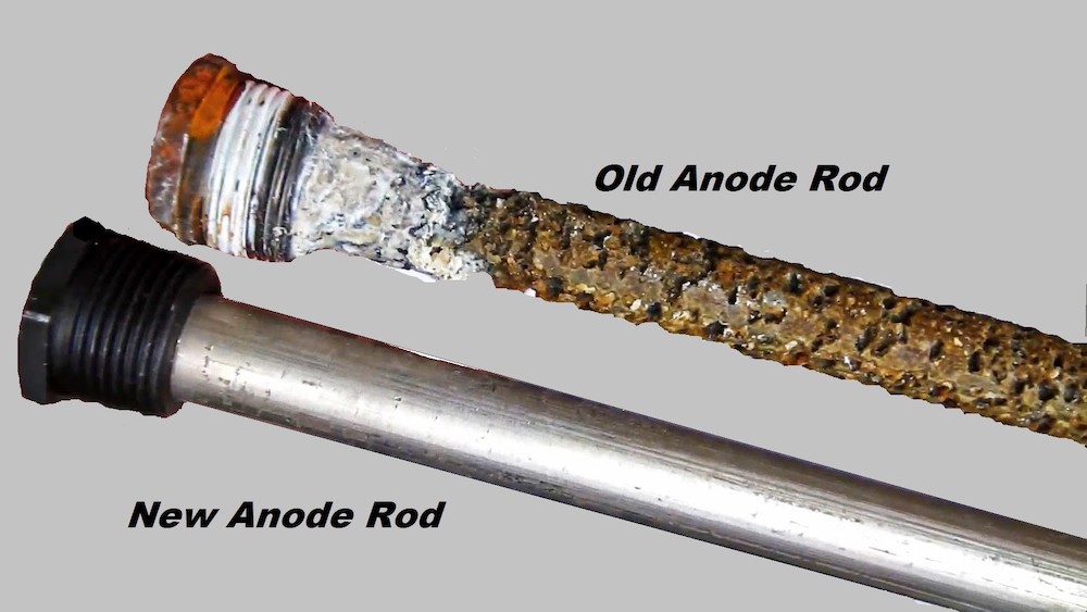 A heavily corroded old anode rod next to a new anode rod